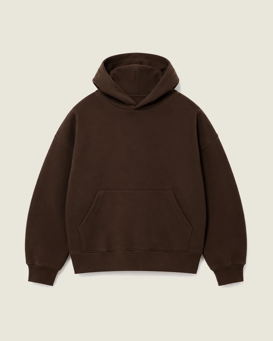 Close-up of a heavyweight cotton fleece hoodie showing brushed fabric texture and structured seams